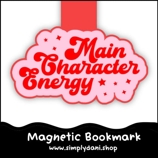 Magnetic bookmark with 'Main Character Energy' text on a pink cloud shape, brand 'Simplydani.shop' visible.